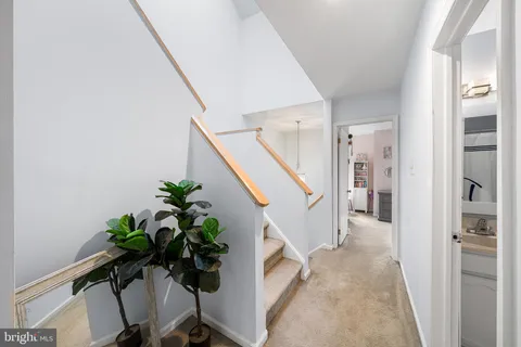 a view of game room with windows and musical instruments