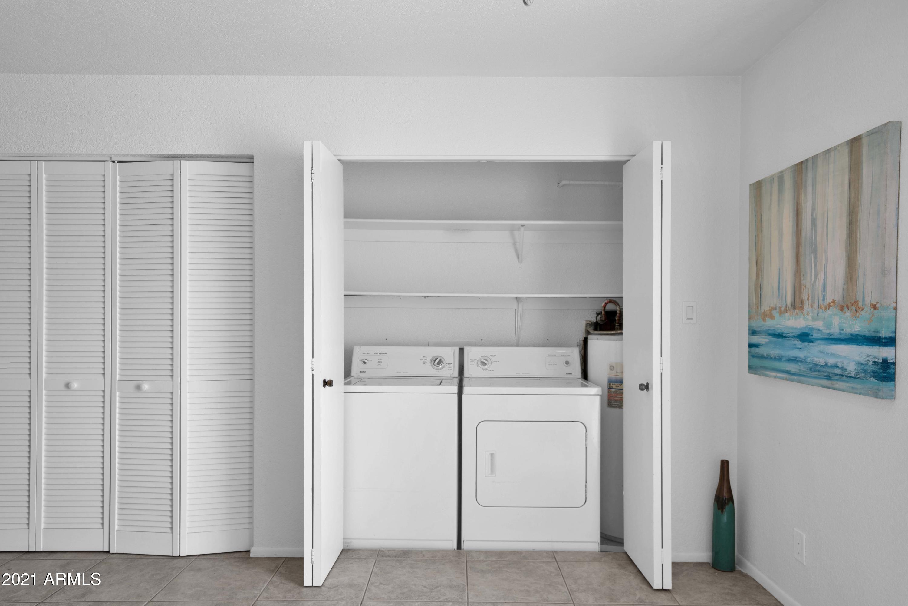97 North Cooper Road, Unit 104 Chandler, AZ 85225 - Photo 9 of 27 a view of washer and dryer
