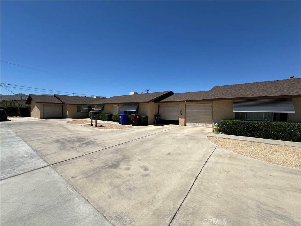 61947 Plaza Road Joshua Tree, CA 92252 - Photo 1 of 1 a view of house with yard and entertaining space