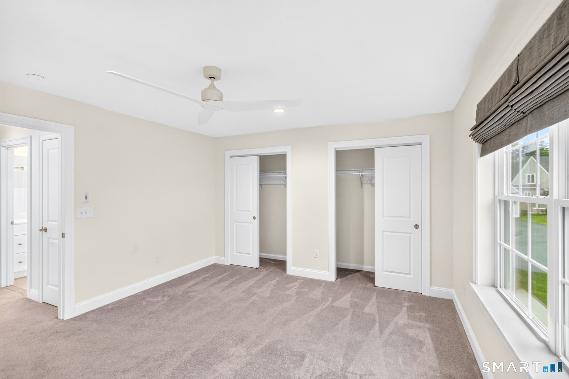 6 Prospect Ridge, Unit 6 Simsbury, CT 06070 - Photo 29 of 33 Bedroom 2 Both bedrooms have double closets and wall-to-wall