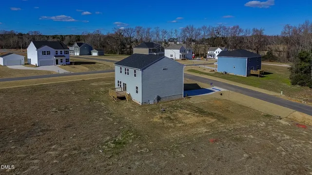 a view of a town with barn house