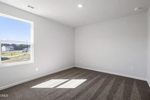 a view of a room that has a window in it