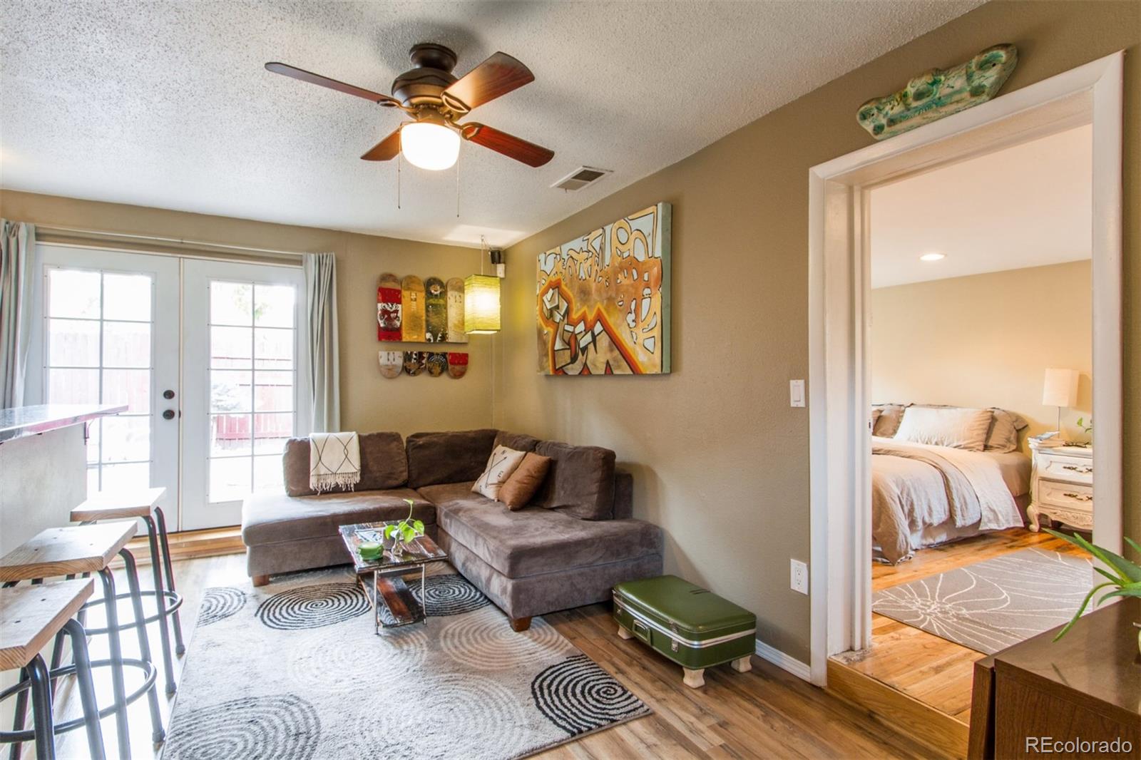 3705 Zuni Street Denver, CO 80211 - Photo 9 of 15 a living room with furniture and a window
