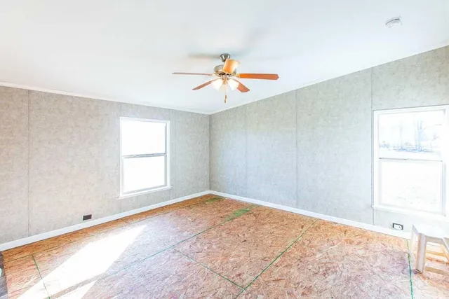a bathroom with a tub and shower