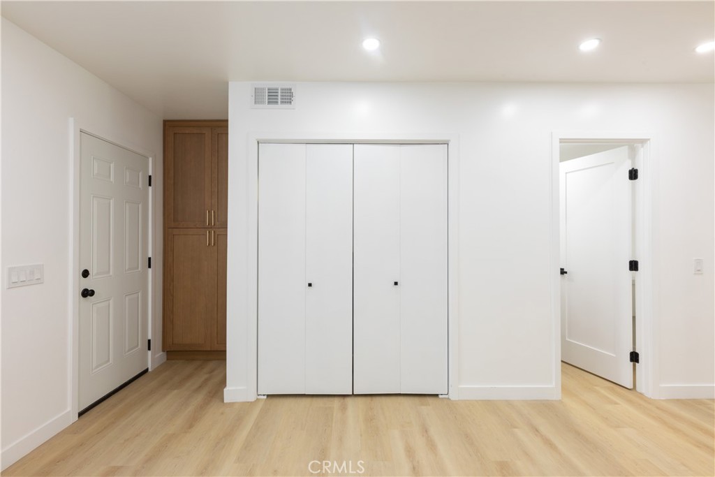 339 Winslow Avenue Long Beach, CA 90814 - Photo 17 of 50 Bathroom, laundry closet and entrance to back patio