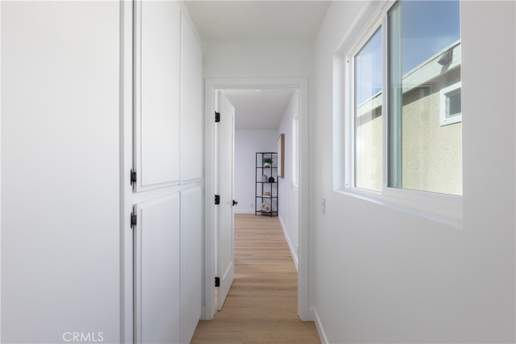 339 Winslow Avenue Long Beach, CA 90814 - Photo 31 of 50 Hallway to rear primary suite