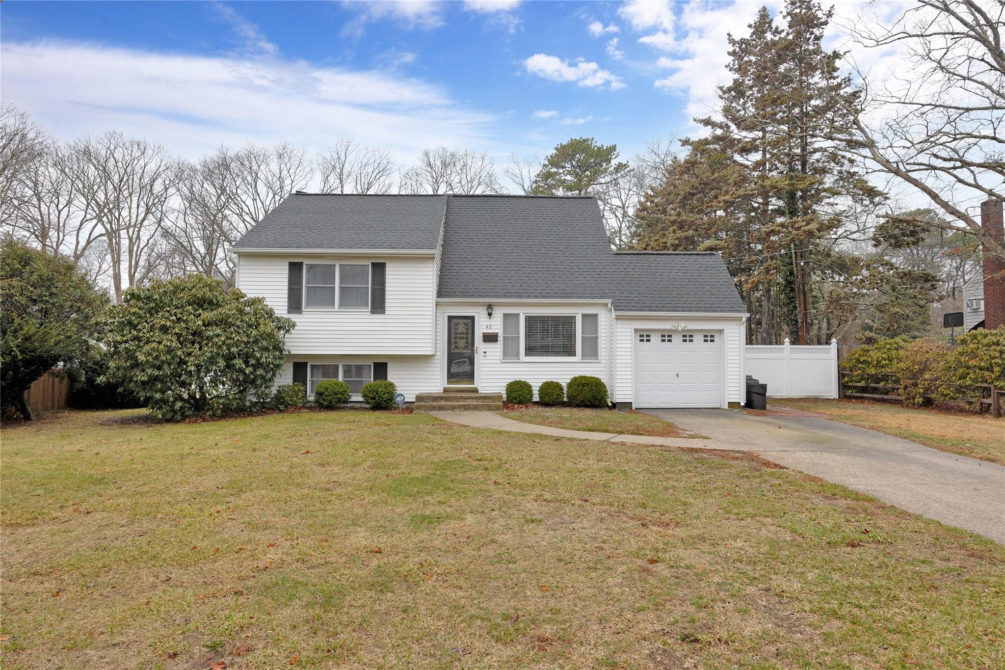 front view of a house with a big yard