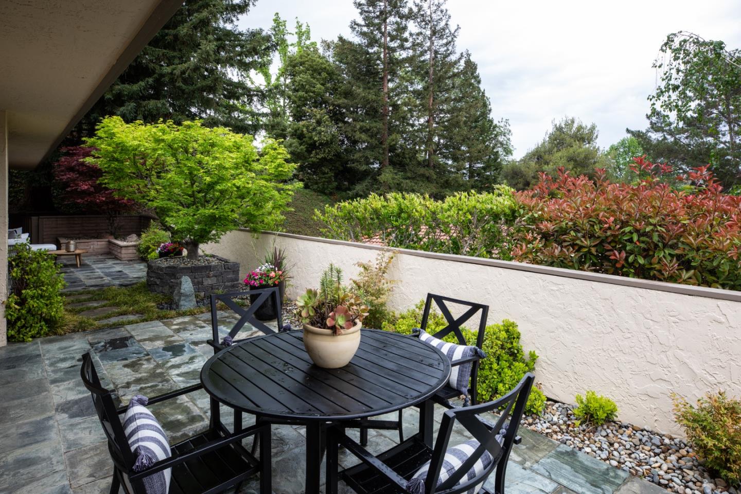 22415 Rancho Deep Cliff Drive Cupertino, CA 95014 - Photo 22 of 33 a view of outdoor dining space with a table and chairs