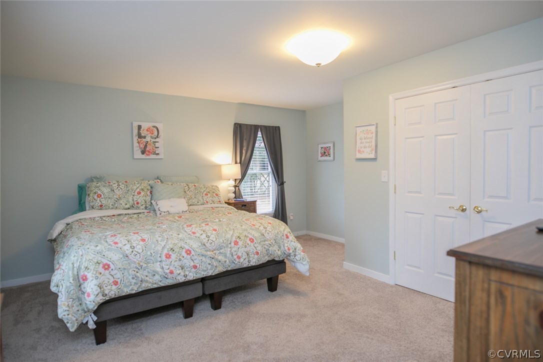 11631 Beach Road Chesterfield, VA 23838 - Photo 24 of 49 a bedroom with a bed and a window