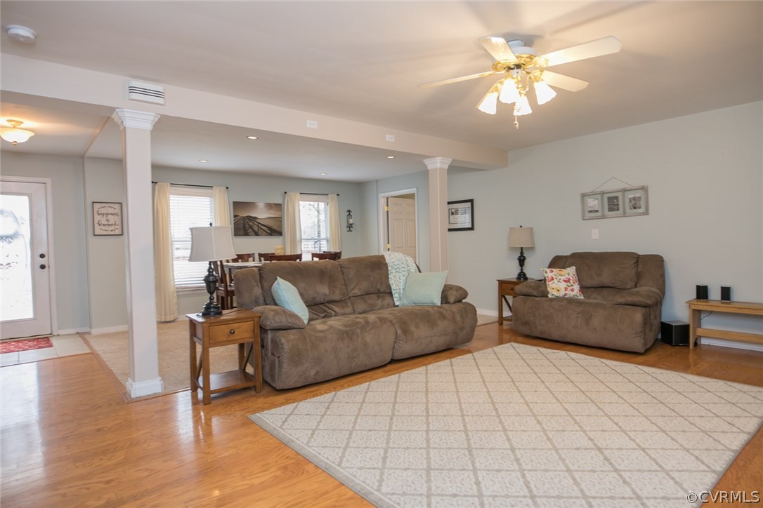 11631 Beach Road Chesterfield, VA 23838 - Photo 3 of 49 a living room with furniture and a chandelier