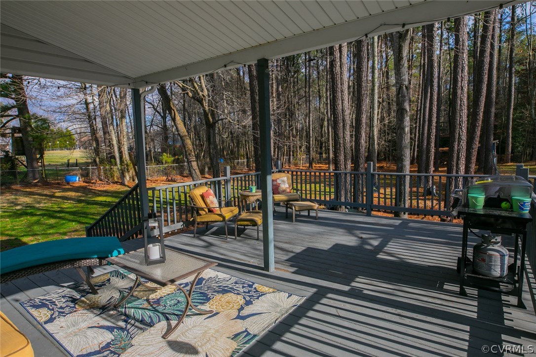 11631 Beach Road Chesterfield, VA 23838 - Photo 36 of 49 a view of a deck with wooden floor and outdoor seating