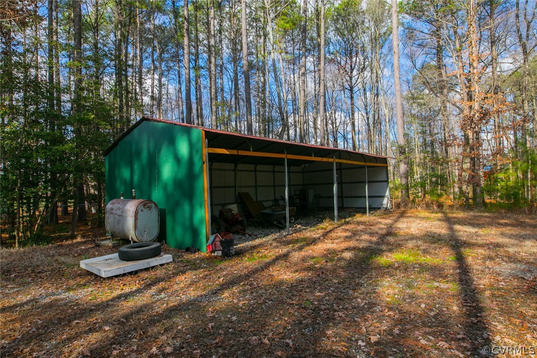 11631 Beach Road Chesterfield, VA 23838 - Photo 42 of 49 a front view of a house with garden