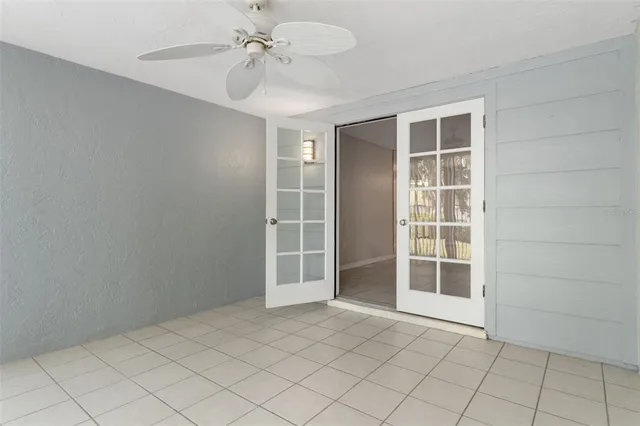 a view of a brick house with a large windows