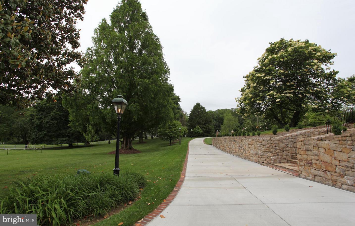 6401 Stallion Road Clifton, VA 20124 - Photo 46 of 67 Driveway View Looking Out To Secure Gate
