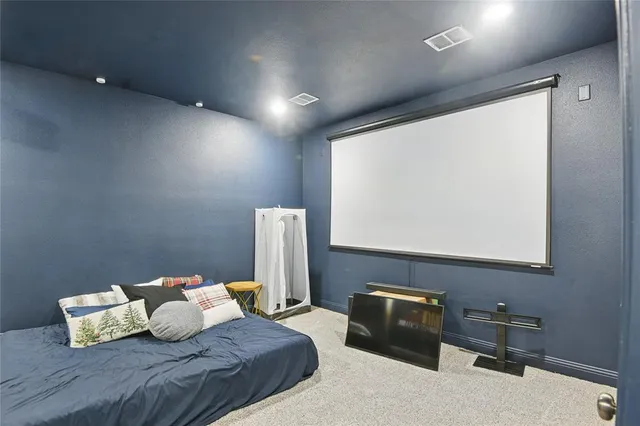 a bedroom with bed and window