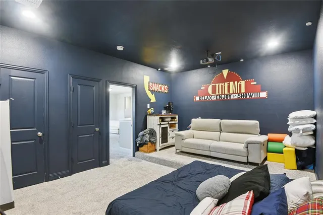 a bedroom with furniture and a gate