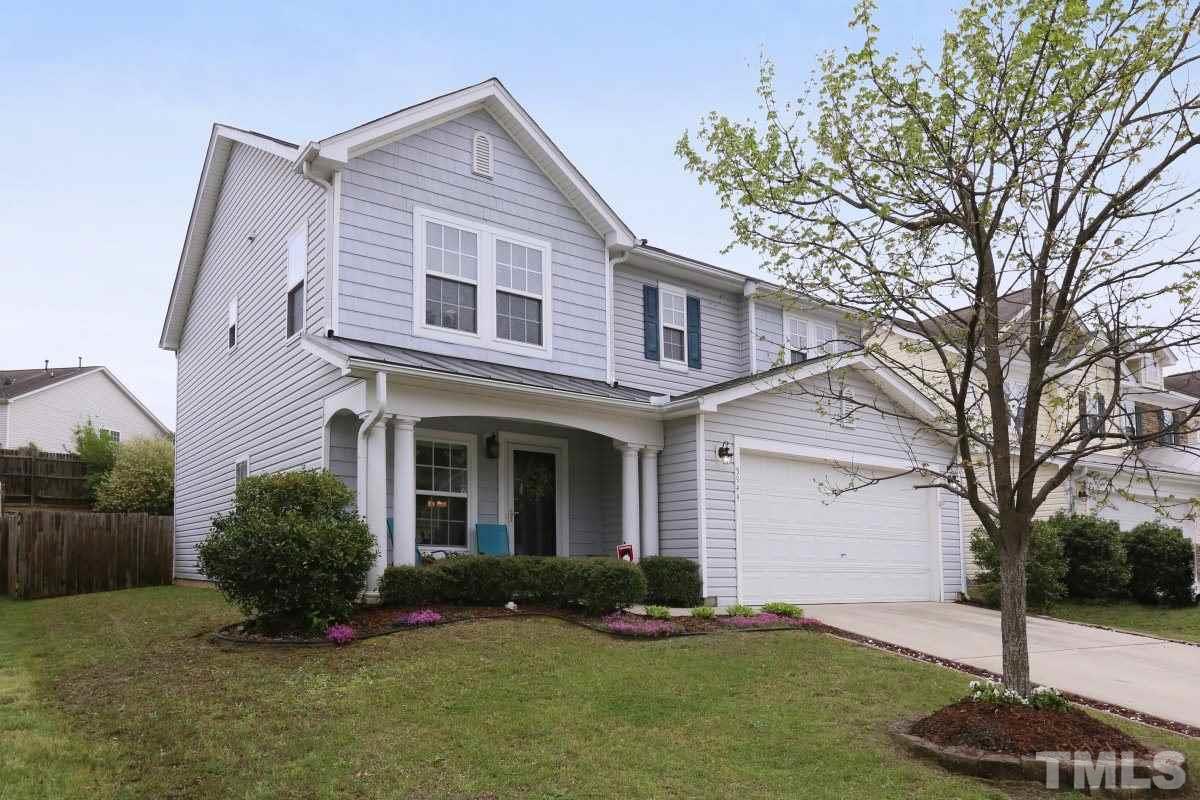 5944 Ricker Road Raleigh, NC 27610 - Photo 2 of 25 a front view of a house with a yard