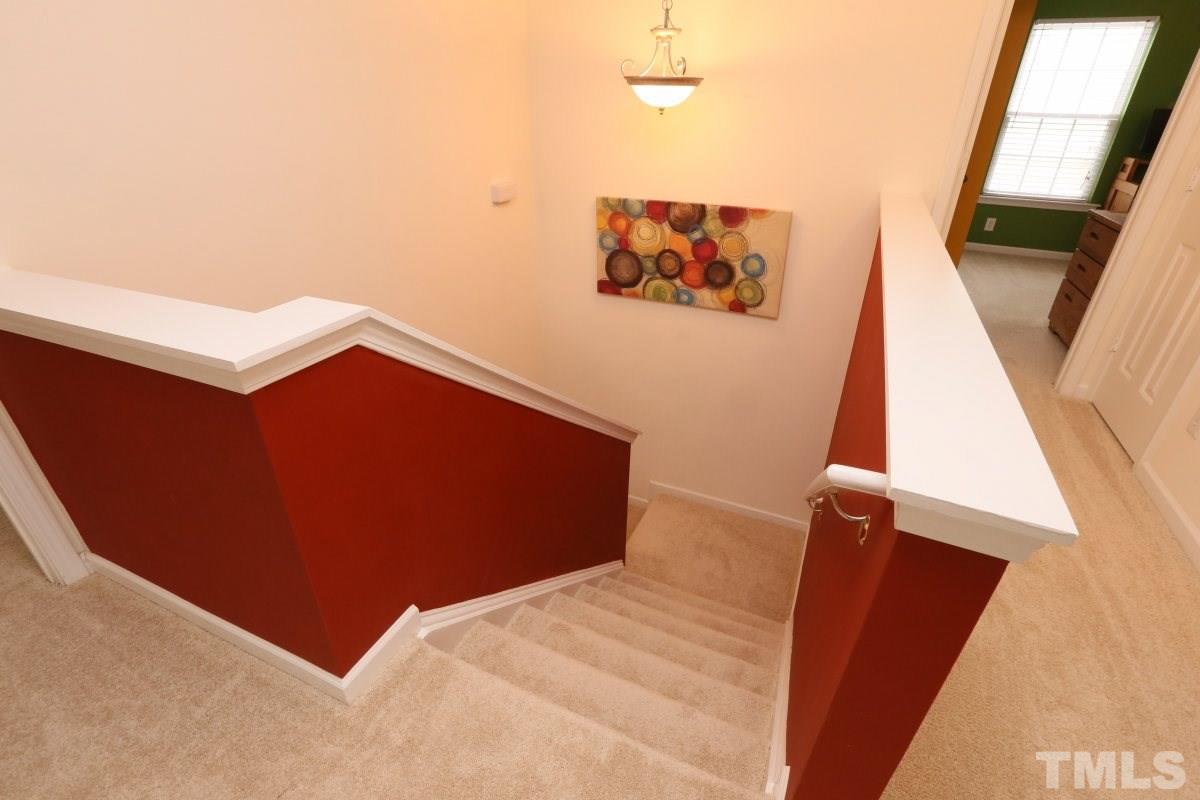 5944 Ricker Road Raleigh, NC 27610 - Photo 19 of 25 a view of stairs