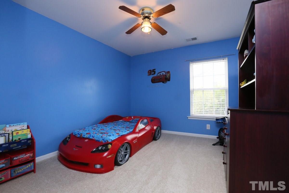5944 Ricker Road Raleigh, NC 27610 - Photo 20 of 25 a room with toys and window