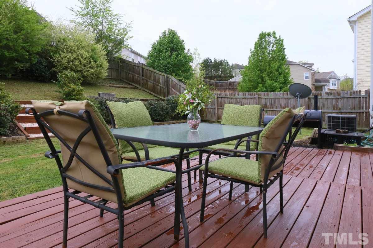 5944 Ricker Road Raleigh, NC 27610 - Photo 23 of 25 a balcony view with a seating space