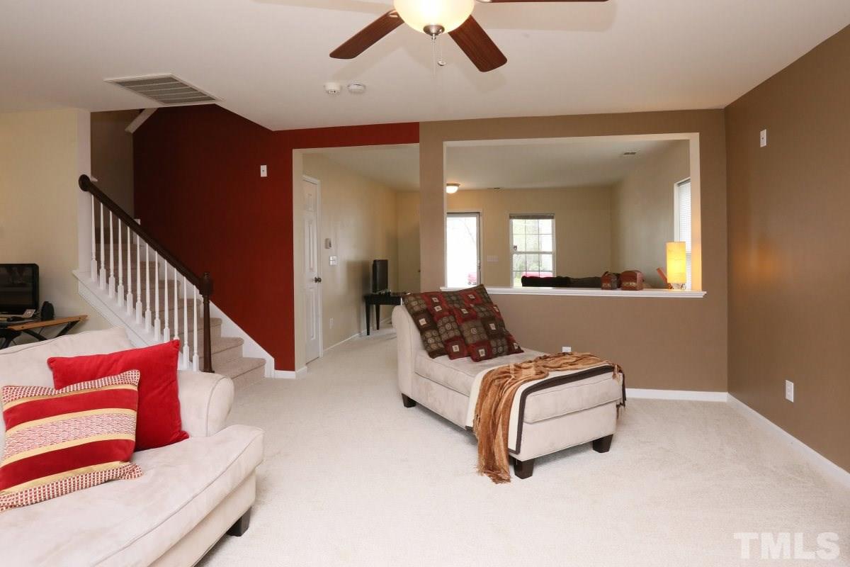 5944 Ricker Road Raleigh, NC 27610 - Photo 9 of 25 a living room with furniture