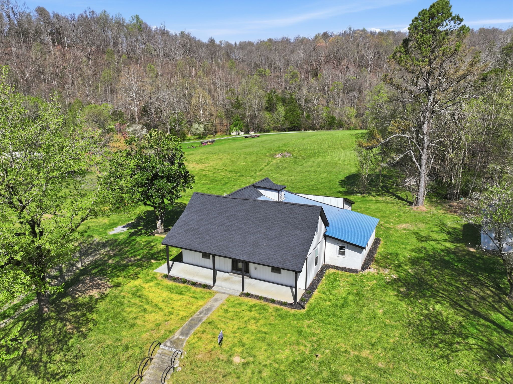 2635 McBrides Branch Road Beechgrove, TN 37018 - Photo 2 of 48 a view of a backyard with mountain view