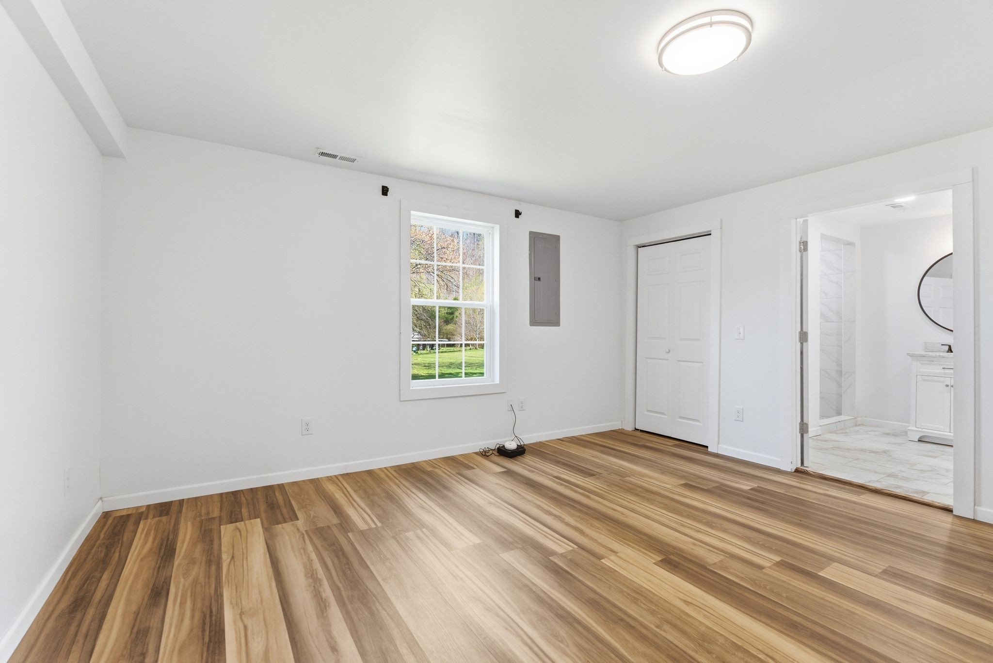 2635 McBrides Branch Road Beechgrove, TN 37018 - Photo 22 of 48 wooden floor in an empty room with a window