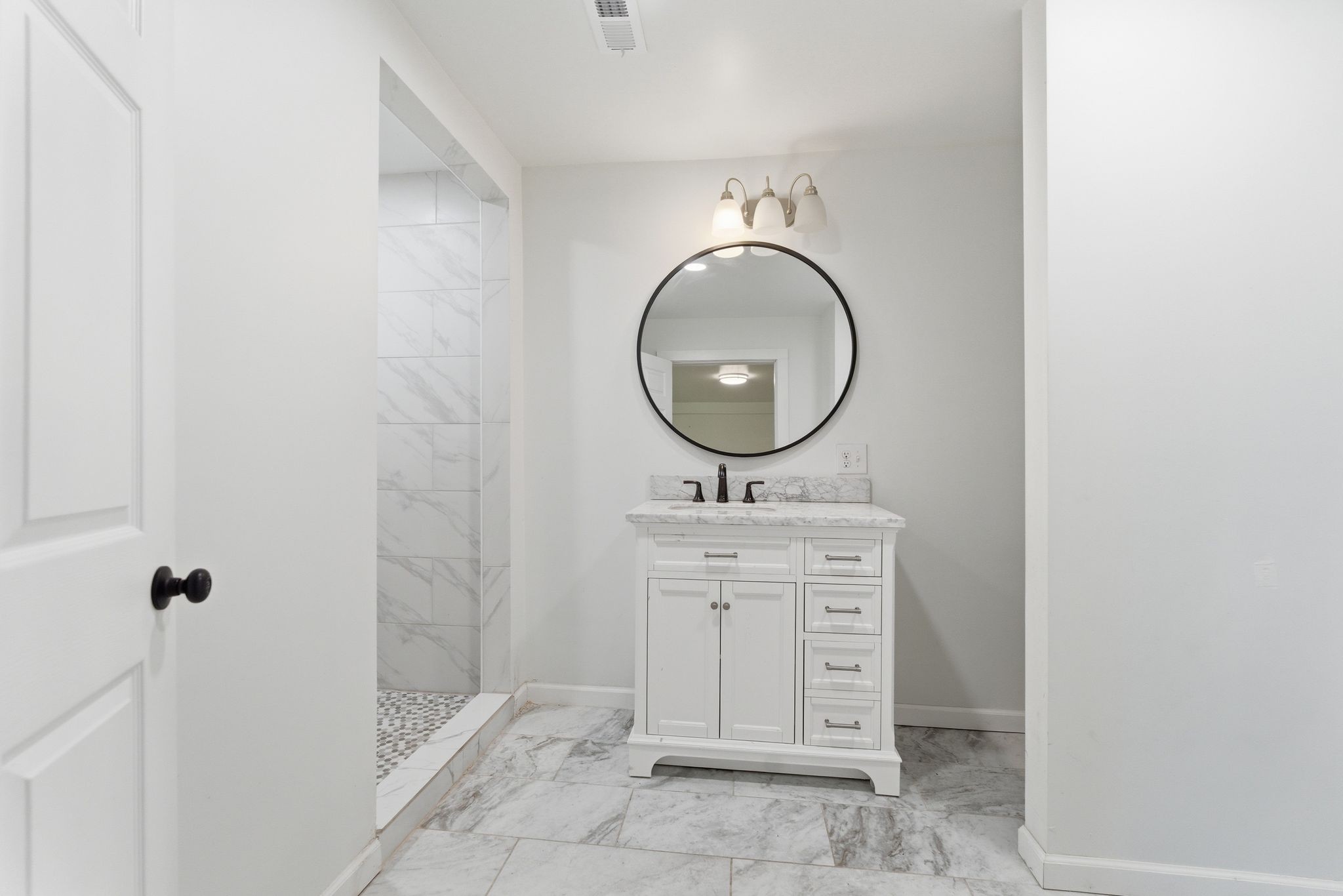 2635 McBrides Branch Road Beechgrove, TN 37018 - Photo 24 of 48 a bathroom with a sink a mirror and vanity