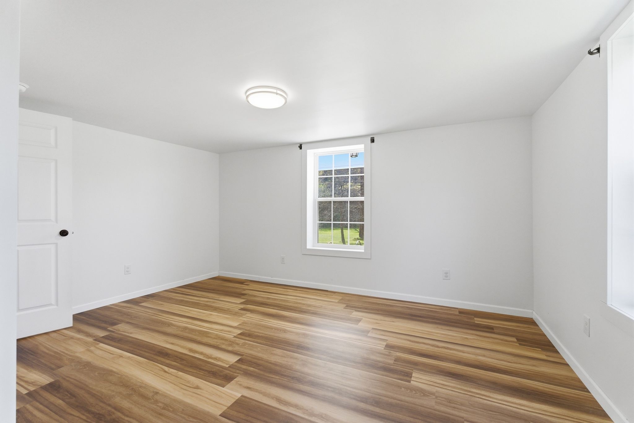 2635 McBrides Branch Road Beechgrove, TN 37018 - Photo 27 of 48 a view of a room with wooden floor and closet