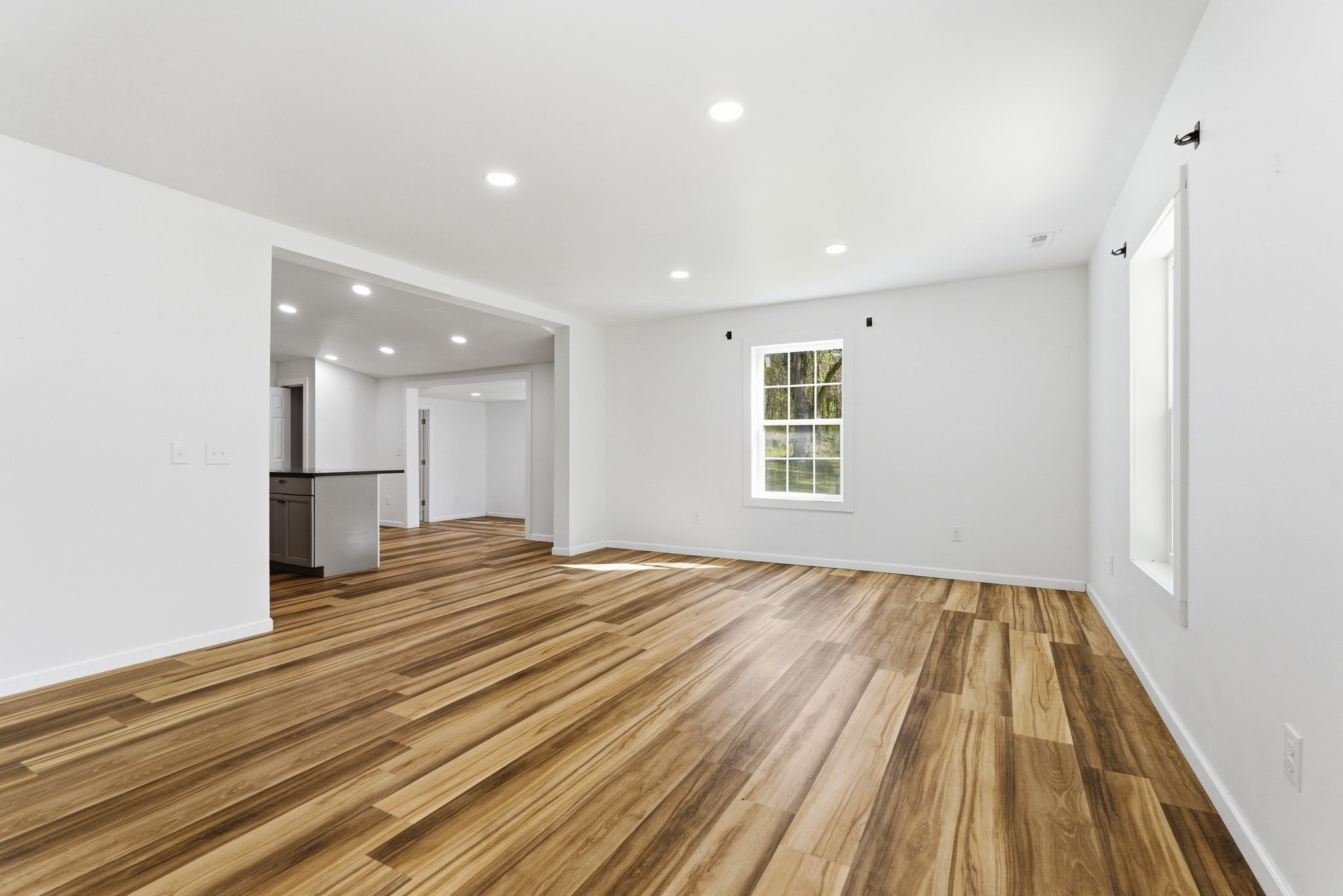 2635 McBrides Branch Road Beechgrove, TN 37018 - Photo 6 of 48 a view of empty room with wooden floor and fan