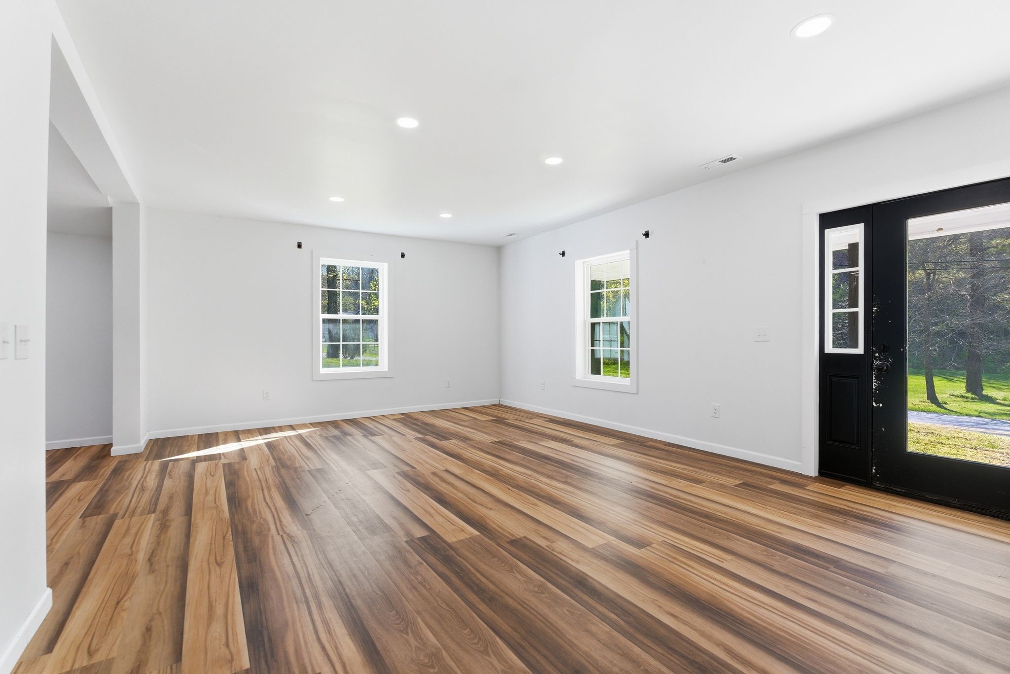 2635 McBrides Branch Road Beechgrove, TN 37018 - Photo 7 of 48 wooden floor in an empty room with a window