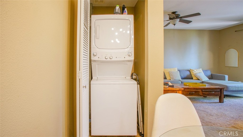 375 Central Avenue, Unit 153 Riverside, CA 92507 - Photo 12 of 24 a view of a bedroom with a bed and wooden floor