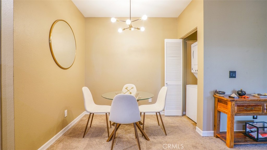 375 Central Avenue, Unit 153 Riverside, CA 92507 - Photo 13 of 24 a view of a room with furniture and a window