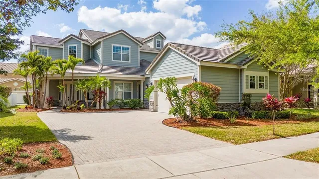 a front view of a house with yard