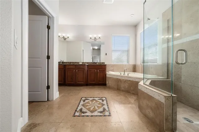 a view of a bathroom from a hallway