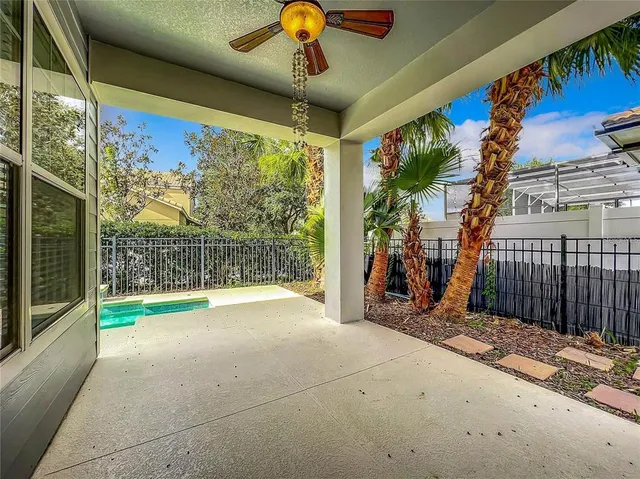 a view of a house with swimming pool in front of it