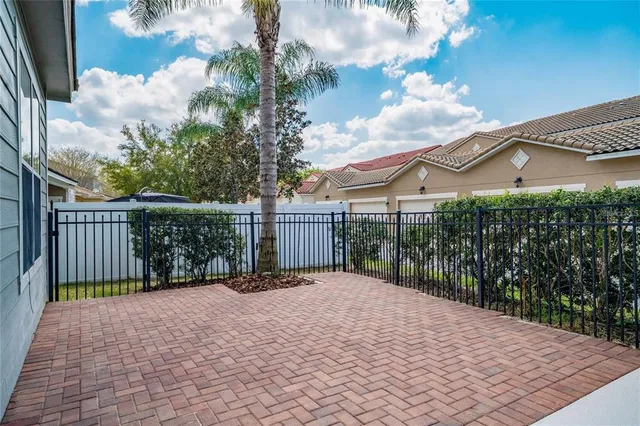 a view of empty room with stairs and mirrors