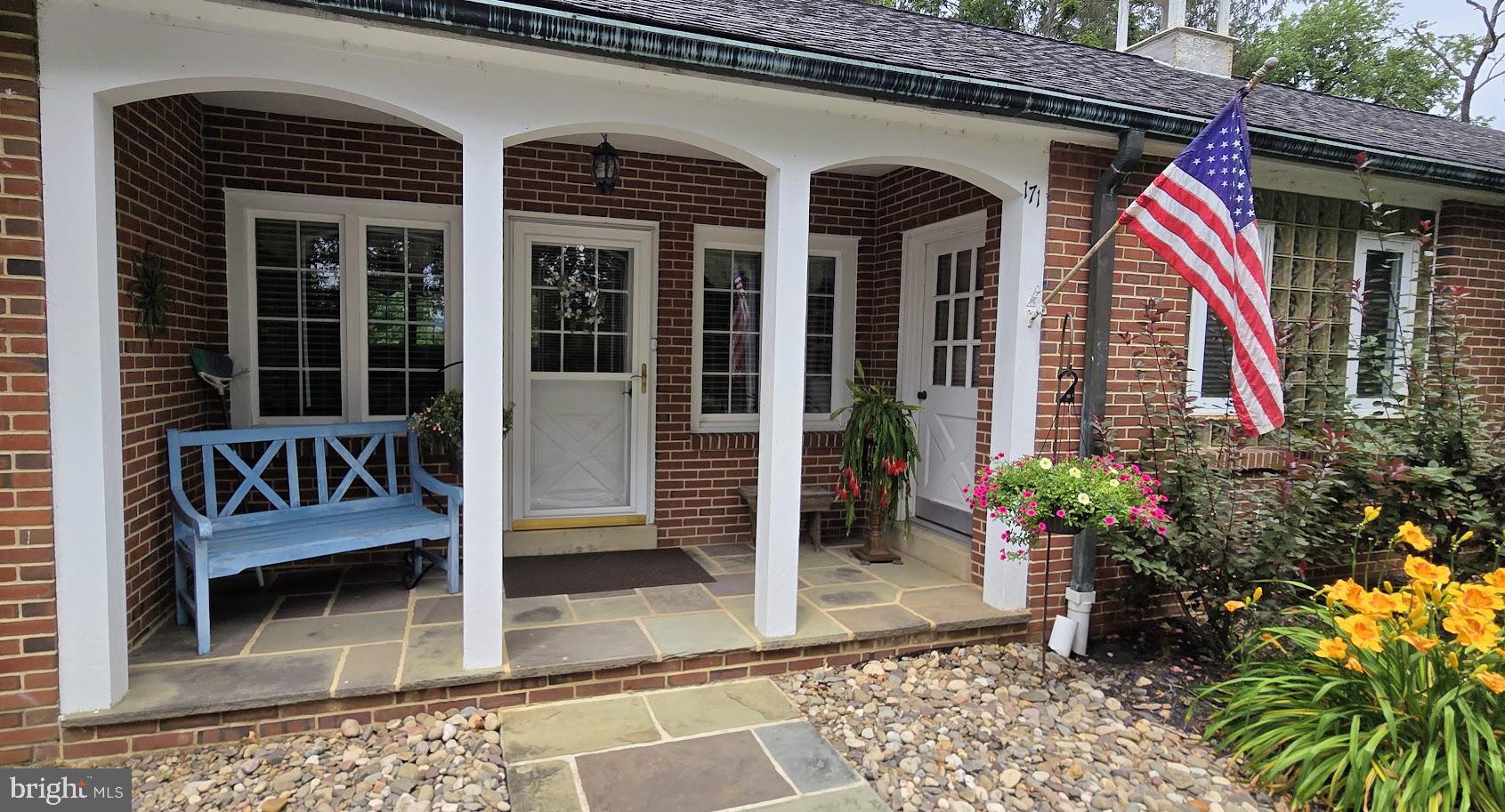 171 Nelson Road Mifflintown, PA 17059 - Photo 10 of 10 Covered Porch entryway to 2nd kitchen & office.