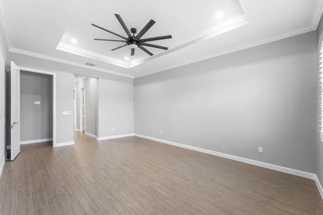 an aerial view of a house with a garden and plants