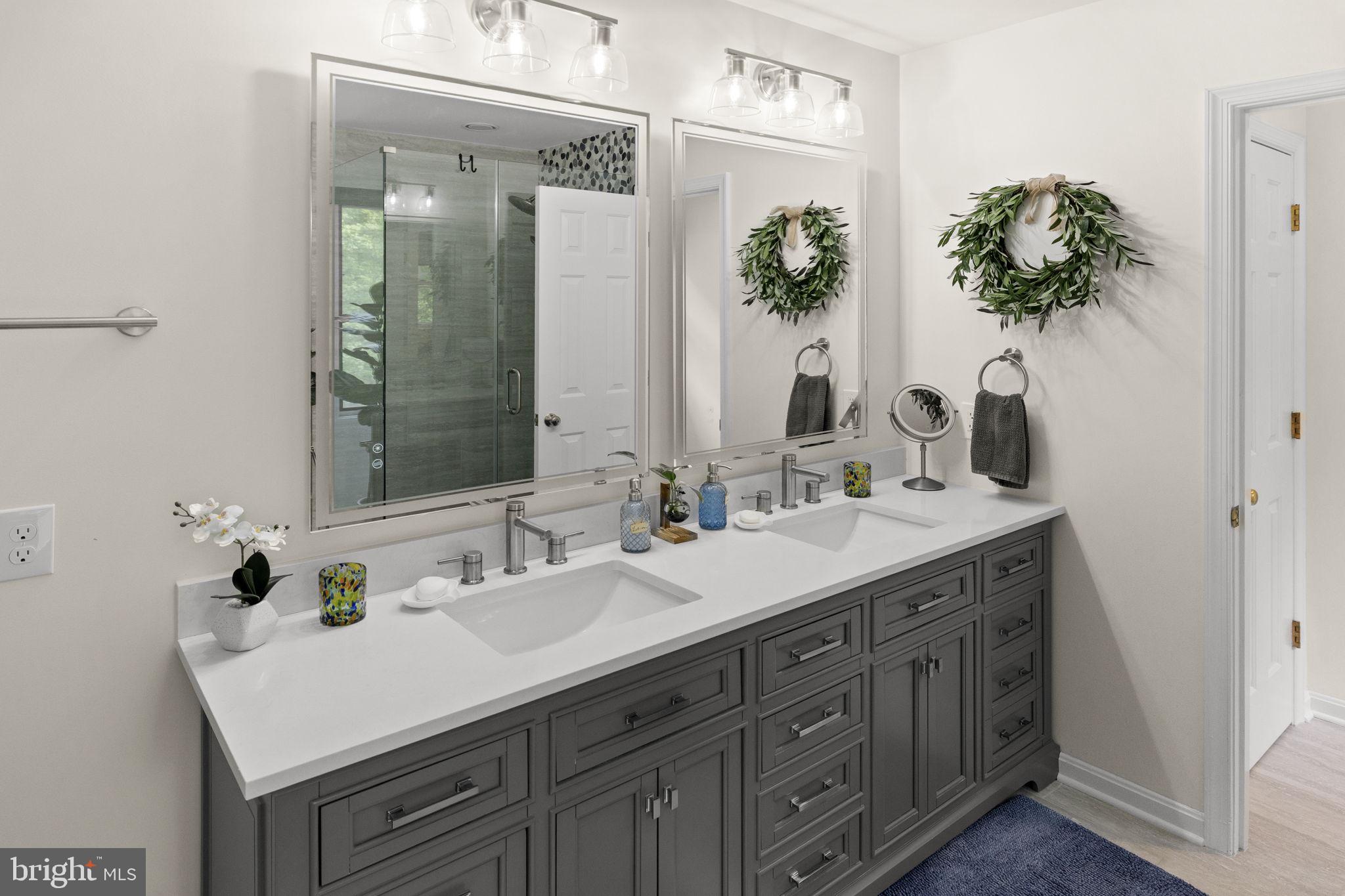 100 Boscobel Road Fredericksburg, VA 22405 - Photo 43 of 67 a bathroom with a sink and a mirror
