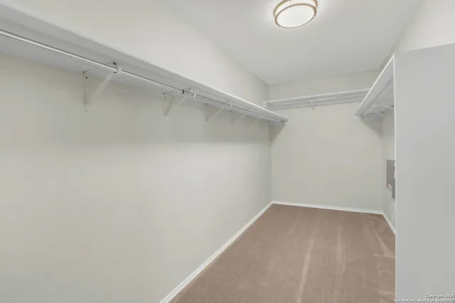 a view of a room with racks on the wall