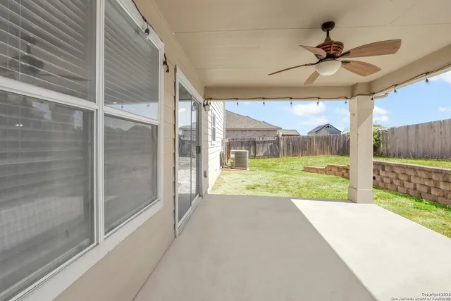 a view of a porch with a backyard
