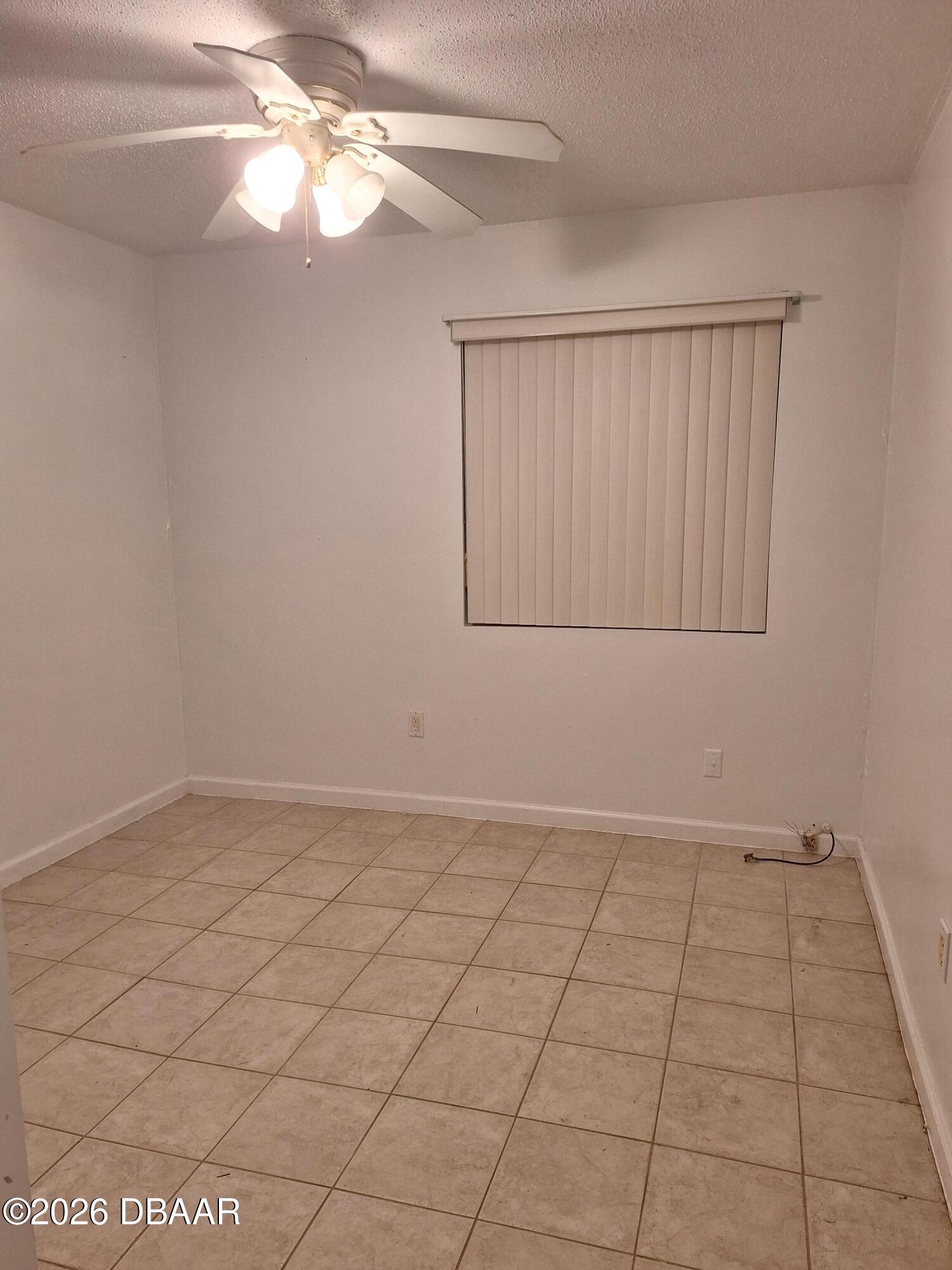 3091 Log Cabin Lane Edgewater, FL 32132 - Photo 11 of 28 a view of an empty room with a window