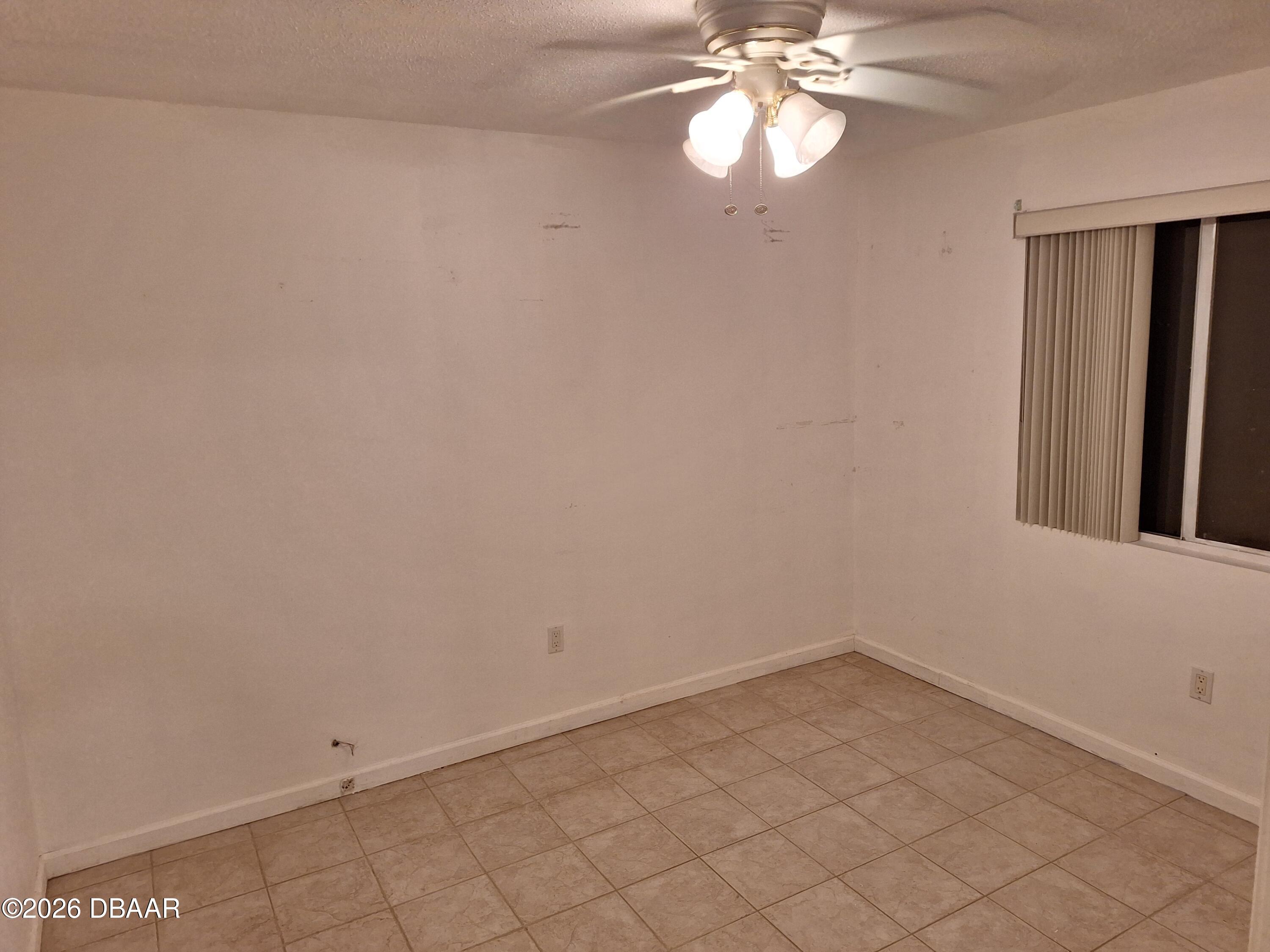3091 Log Cabin Lane Edgewater, FL 32132 - Photo 13 of 28 wooden floor in an empty room