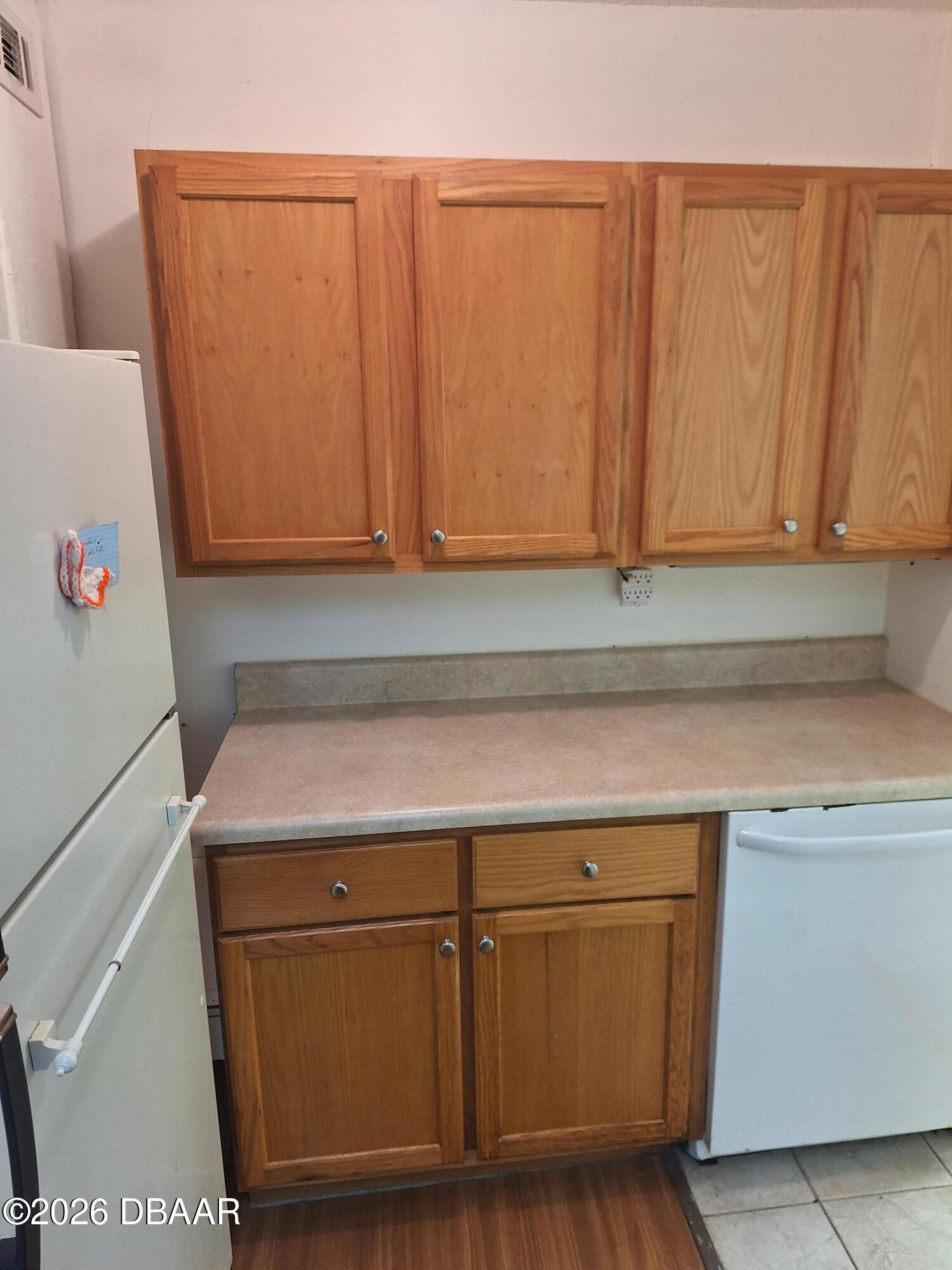 3091 Log Cabin Lane Edgewater, FL 32132 - Photo 18 of 28 a close view of wooden cabinets