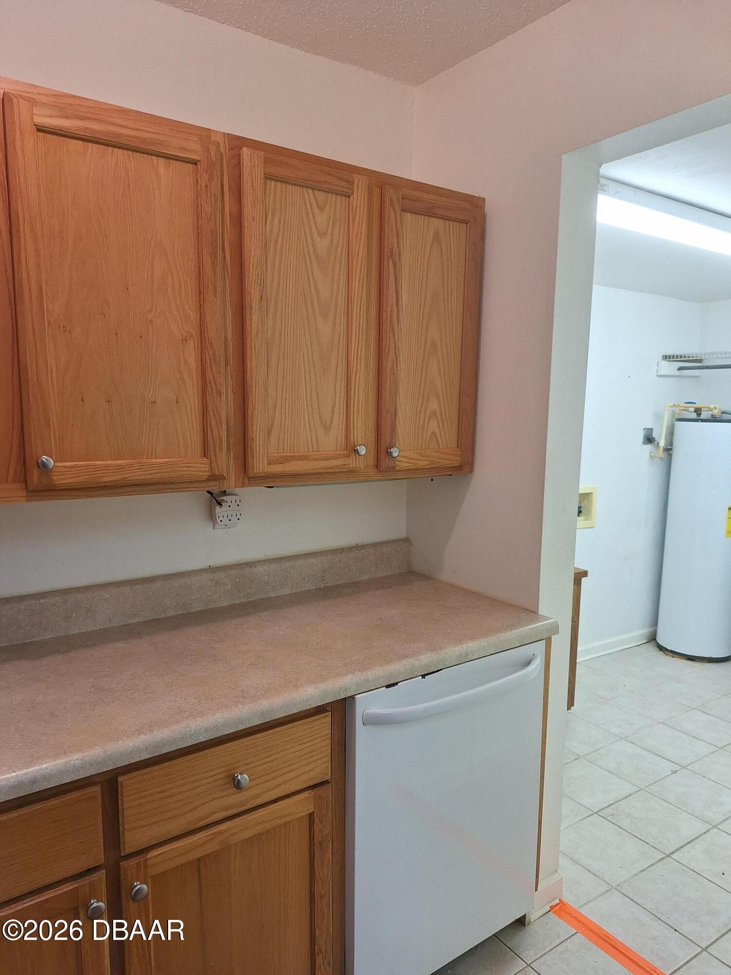 3091 Log Cabin Lane Edgewater, FL 32132 - Photo 19 of 28 a view of a storage and utility room with washer and dryer