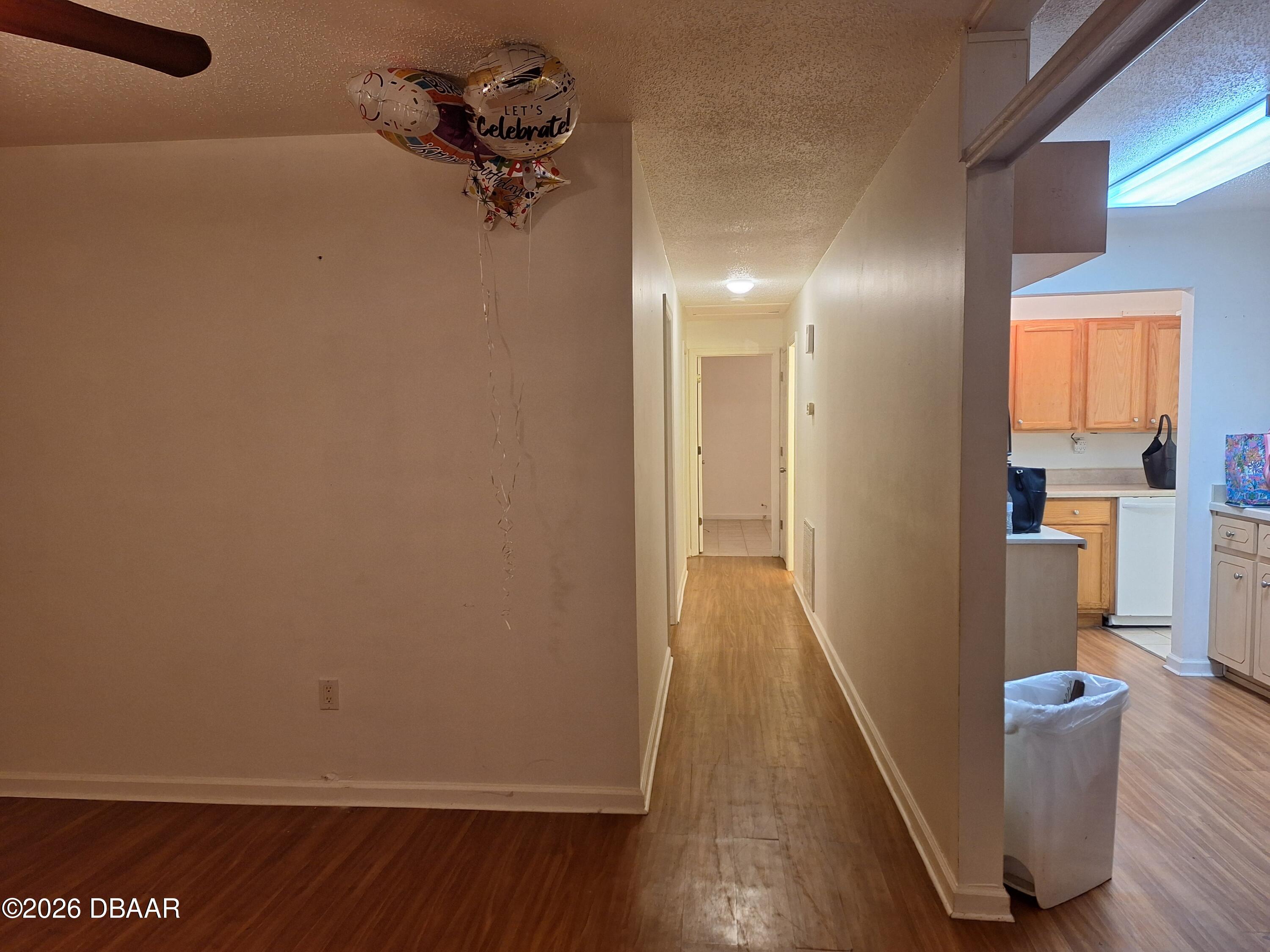 3091 Log Cabin Lane Edgewater, FL 32132 - Photo 20 of 28 a view of a room with wooden floor