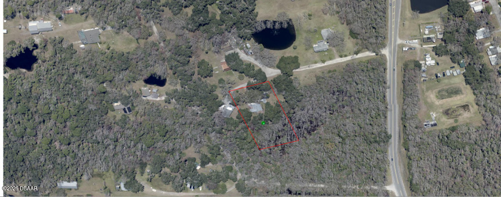 3091 Log Cabin Lane Edgewater, FL 32132 - Photo 28 of 28 a view of a dry yard in front of house