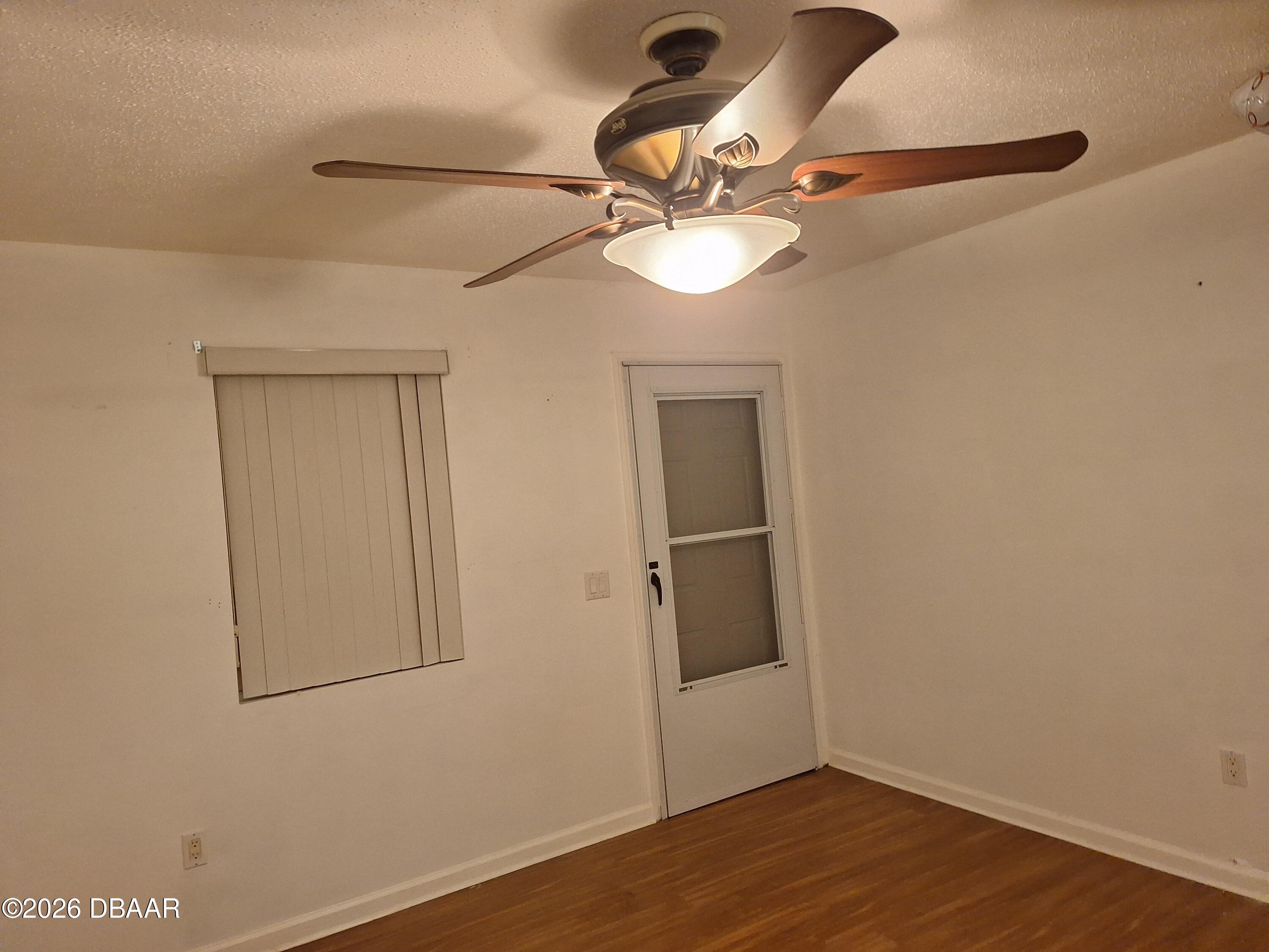 3091 Log Cabin Lane Edgewater, FL 32132 - Photo 10 of 28 a view of a room with wooden floor