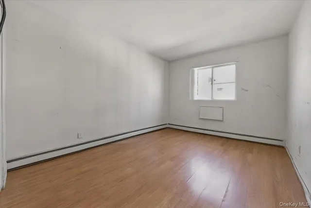 a view of a house with wooden deck